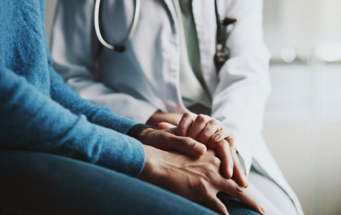 A private doctor caring for a patient